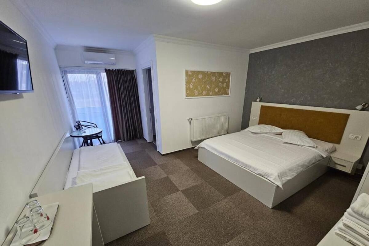 Standard Triple Room, Balcony | Desk, free WiFi
