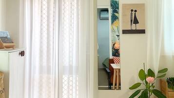 Comfort Apartment | Living area | 32-inch Smart TV with digital channels