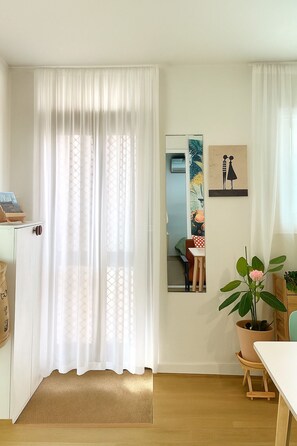 Comfort Apartment | Living area | 32-inch Smart TV with digital channels