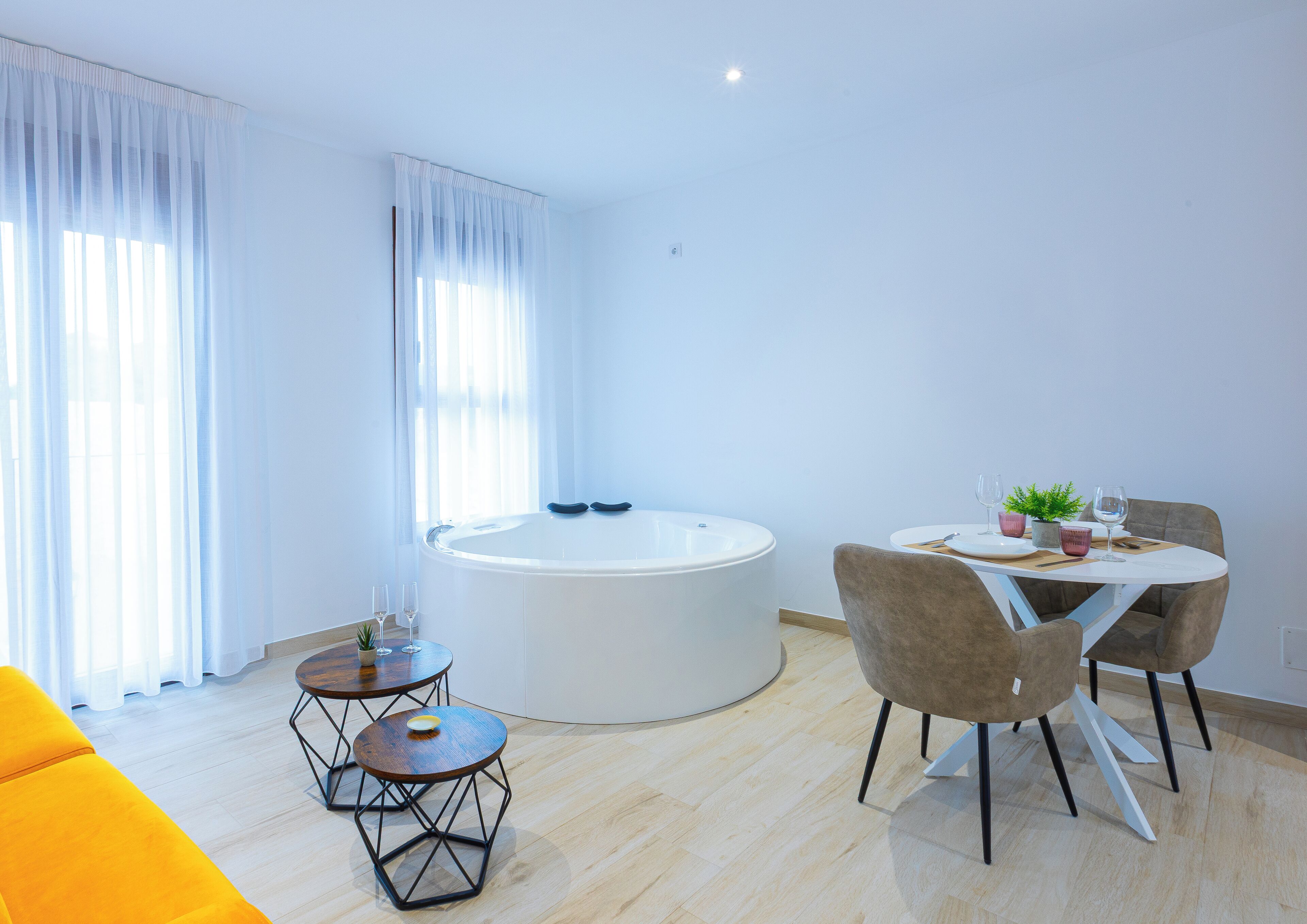 Deluxe Apartment, Pool View | Living area | 50-inch Smart TV with digital channels, fireplace, Netflix