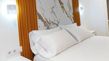 Comfort Studio | Premium bedding, down comforters, Select Comfort beds, desk