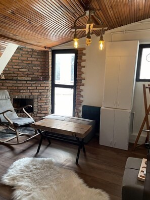 Deluxe-loftsværelse | Opholdsområde | Printere