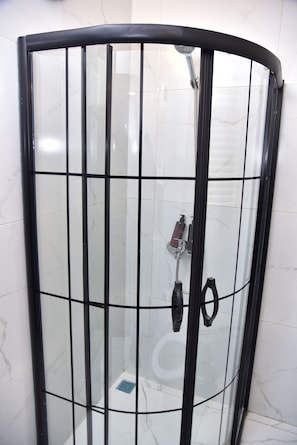 Family Apartment, City View | Bathroom | Shower, hair dryer, slippers, towels - Palmy Istiklal (İstanbul)