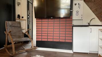 Deluxe-loftsværelse | Opholdsområde | Printere