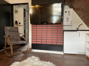 Deluxe-loftsværelse | Opholdsområde | Printere