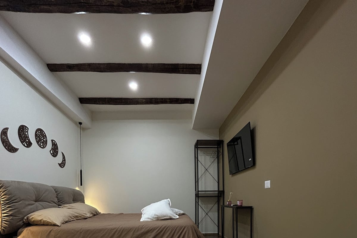 غرفة ديلوكس رباعية - بشرفة - منظر للمدينة | واي فاي مجانًا