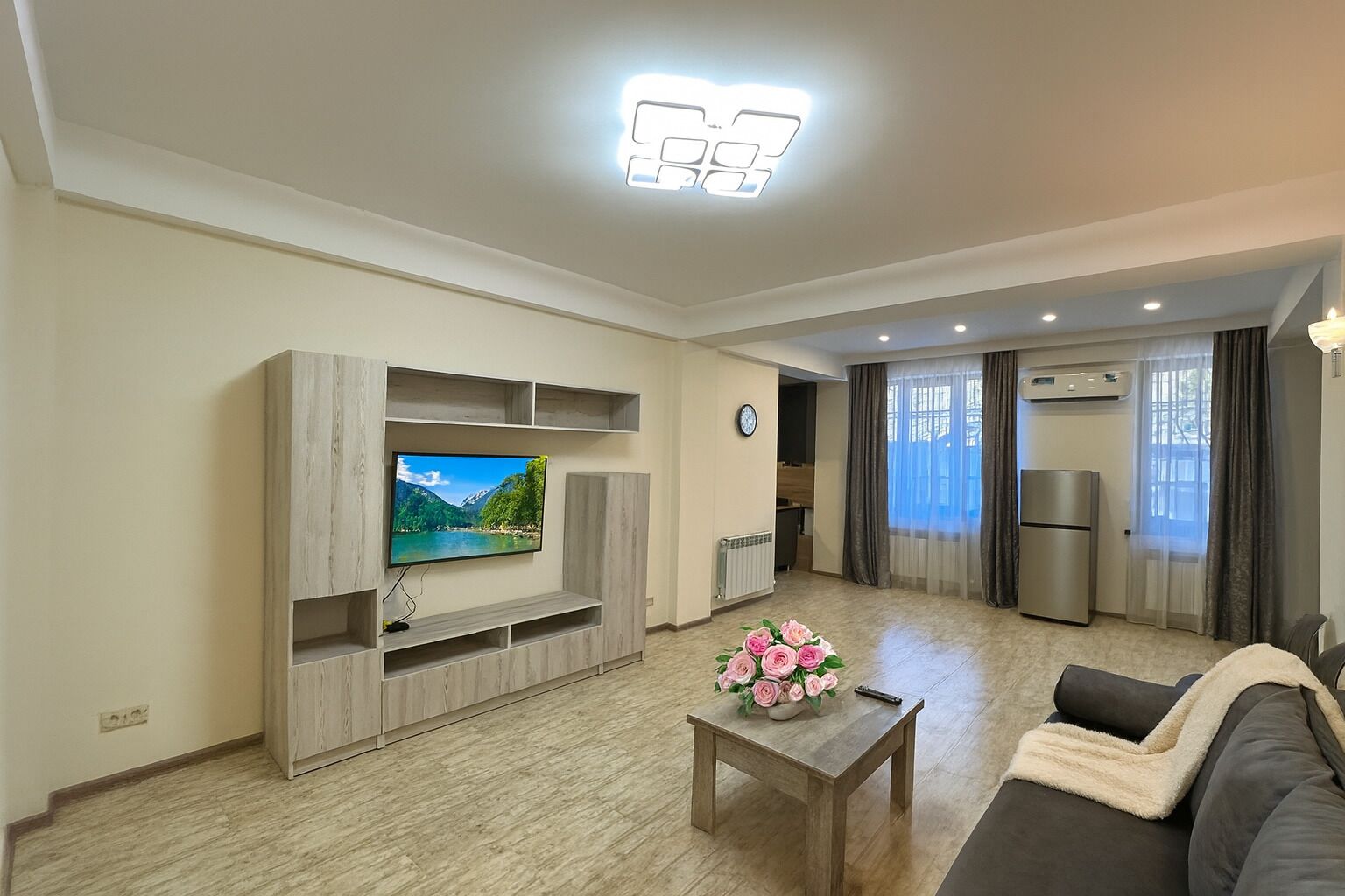 Economy Cottage | Living area | 50-inch flat-screen TV with cable channels