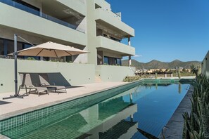 Pool - Oceanview condo w/ private patio steps to the main beach at Cerritos. Modern 2-bedroom home, a 1-minute walk to the beach, perfect for families or couples looking for quiet luxury and reliable Wi-Fi. (Playa Los Cerritos)