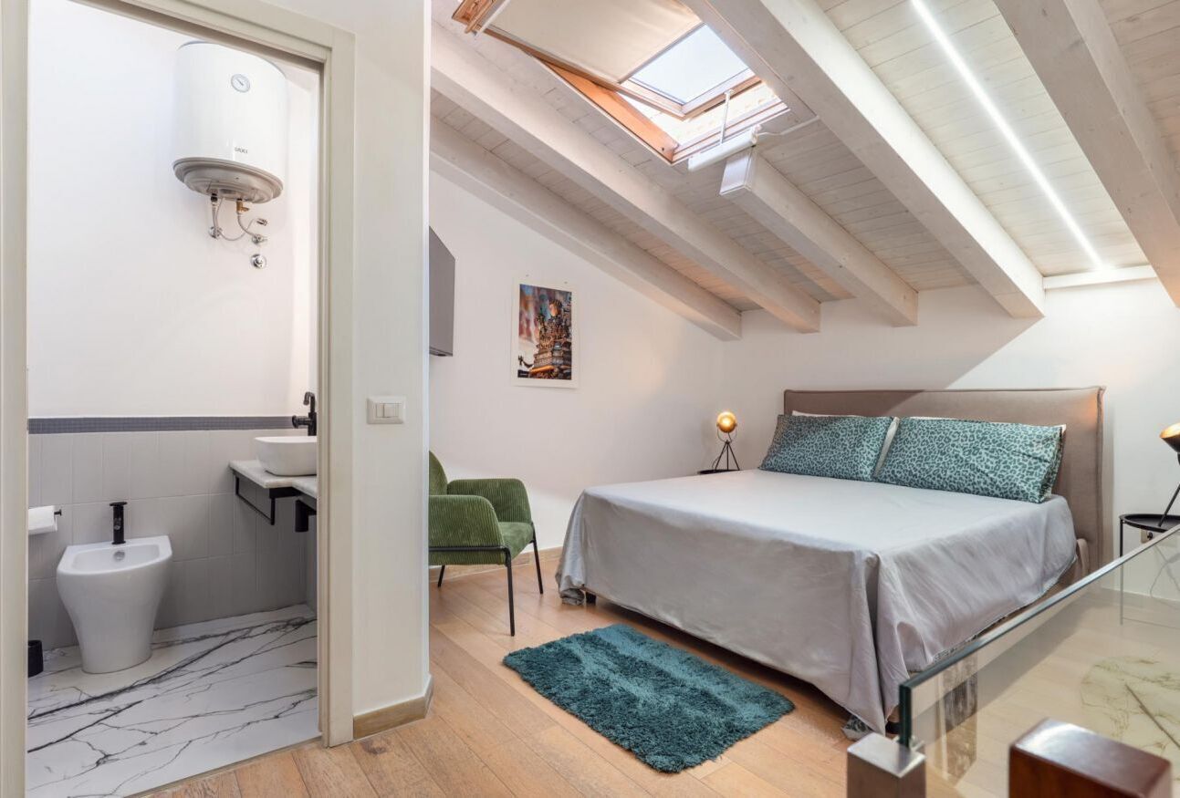 1 soverom og strykejern/-brett