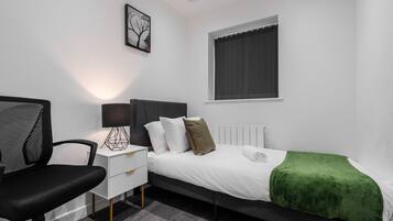 4 bedrooms, desk, iron/ironing board, travel crib