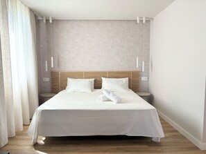 1 dormitorio, tabla de planchar con plancha, wifi gratis y ropa de cama