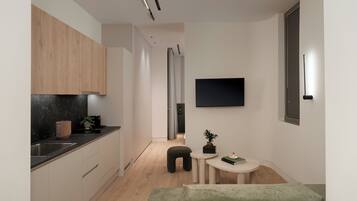 Habitación doble Deluxe, balcón, vista a la ciudad | Caja de seguridad en la habitación y espacio para trabajar con laptop