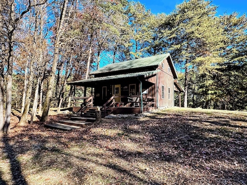 
Pine Oaks Cabin includes Guest Pole Barn. Modern comfort meets county living.