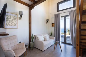 Living area - Eneos Boutique Residence - Koroni Poolside Jewel (QXW3+7GQ Koroni, Greece)