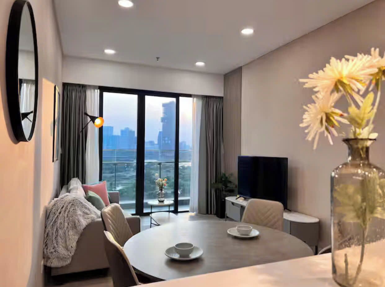 Grand Suite, 1 Bedroom, Club Lounge Access, River View | Living area | 65-inch Smart TV with cable channels, fireplace, Netflix