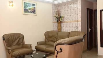 Suite Supérieure, balcon | Coin séjour