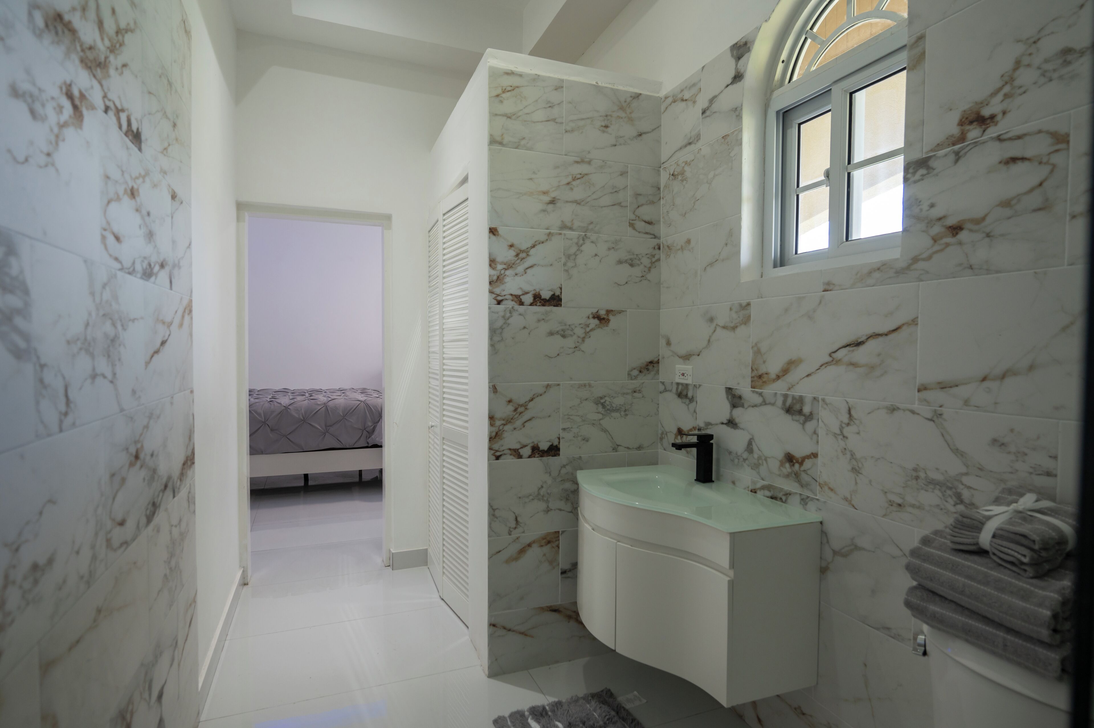 Shower, jetted tub, towels, soap