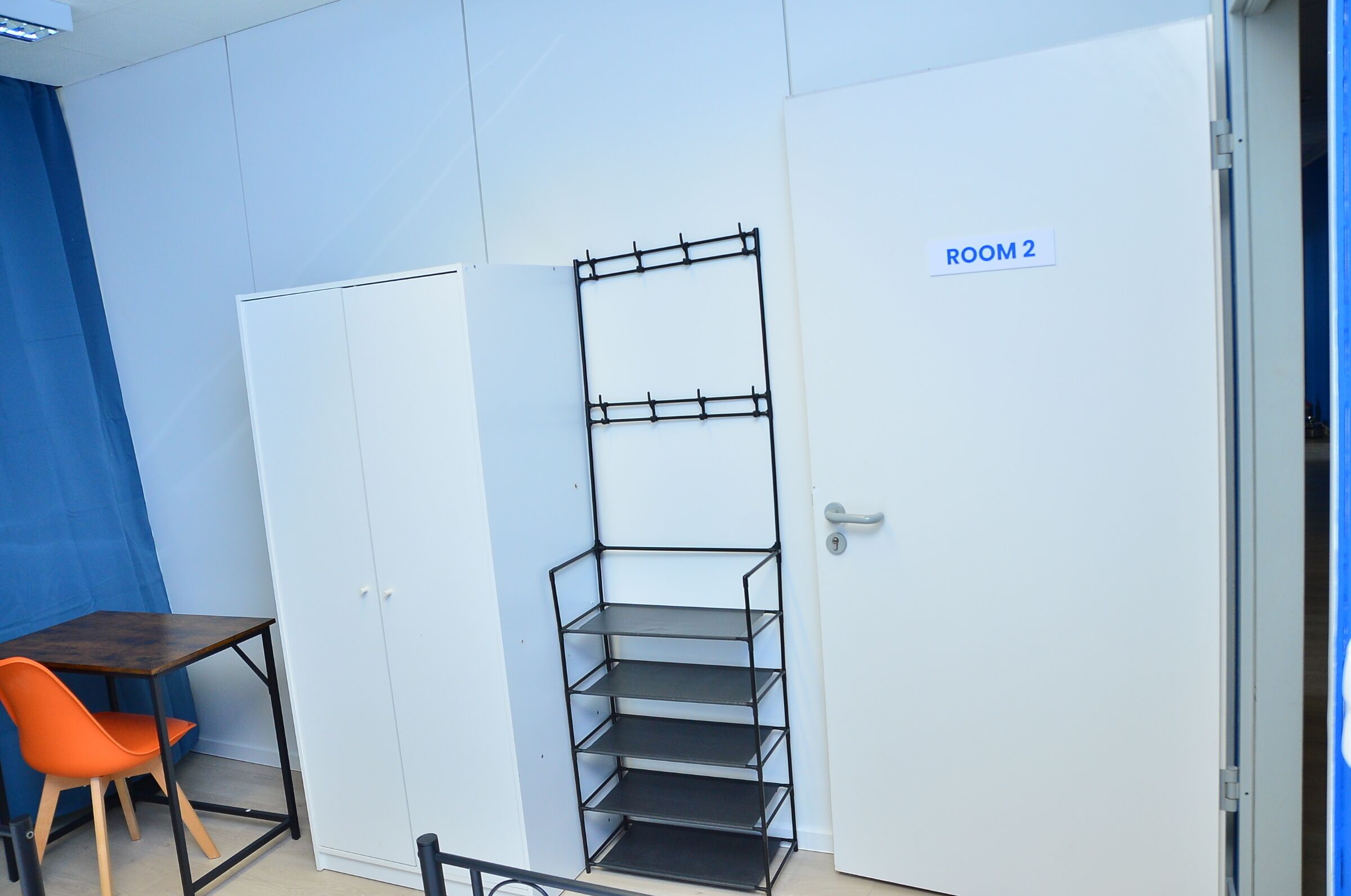 Desk, laptop workspace, blackout curtains, iron/ironing board