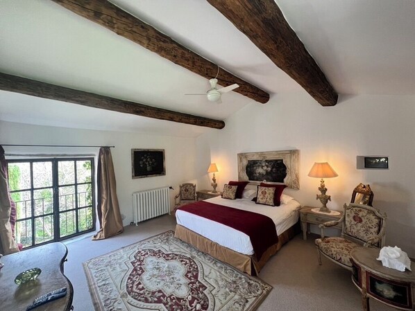 Junior Double Room, Patio, Garden View | Minibar, in-room safe, free WiFi