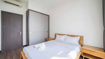 Suite Grand, 1 kamar tidur, Akses Club Lounge, pemandangan kota | Seprai katun Mesir, seprai premium, dan selimut bulu angsa