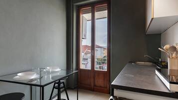 Fridge, stovetop, cookware/dishes/utensils