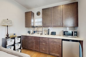 Microwave, stovetop, coffee/tea maker, toaster