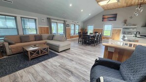 TV, fireplace - Sea You Soon: Screened Porch, Fenced Yard, Pet-Friendly (Ocracoke)
