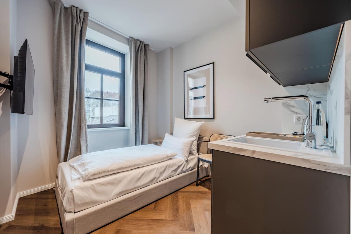 Single Room | Premium bedding, down comforters, memory foam beds, cribs/infant beds