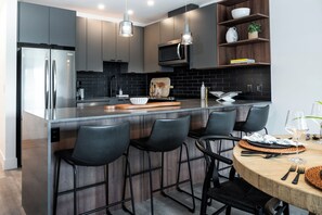 Alpine Ascent (Unit 2213) | Private kitchen | Full-size fridge, microwave, oven, stovetop - Alpine Ascent (Revelstoke)