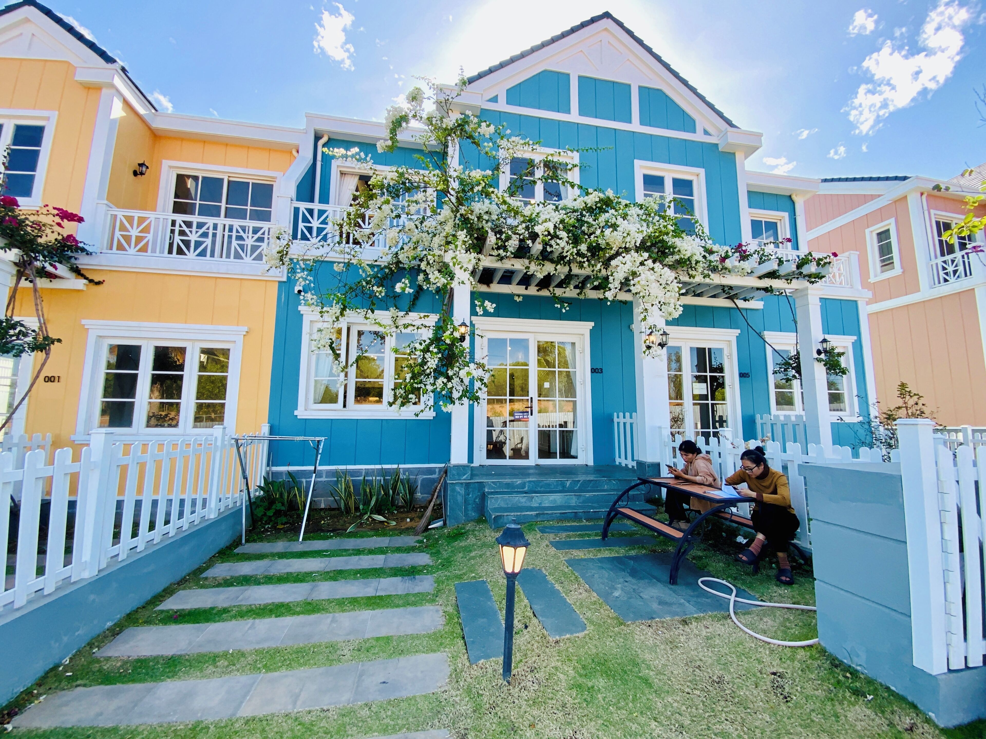 Desk, laptop workspace, blackout curtains, iron/ironing board