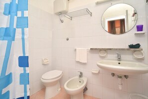 Shower, towels, soap, shampoo