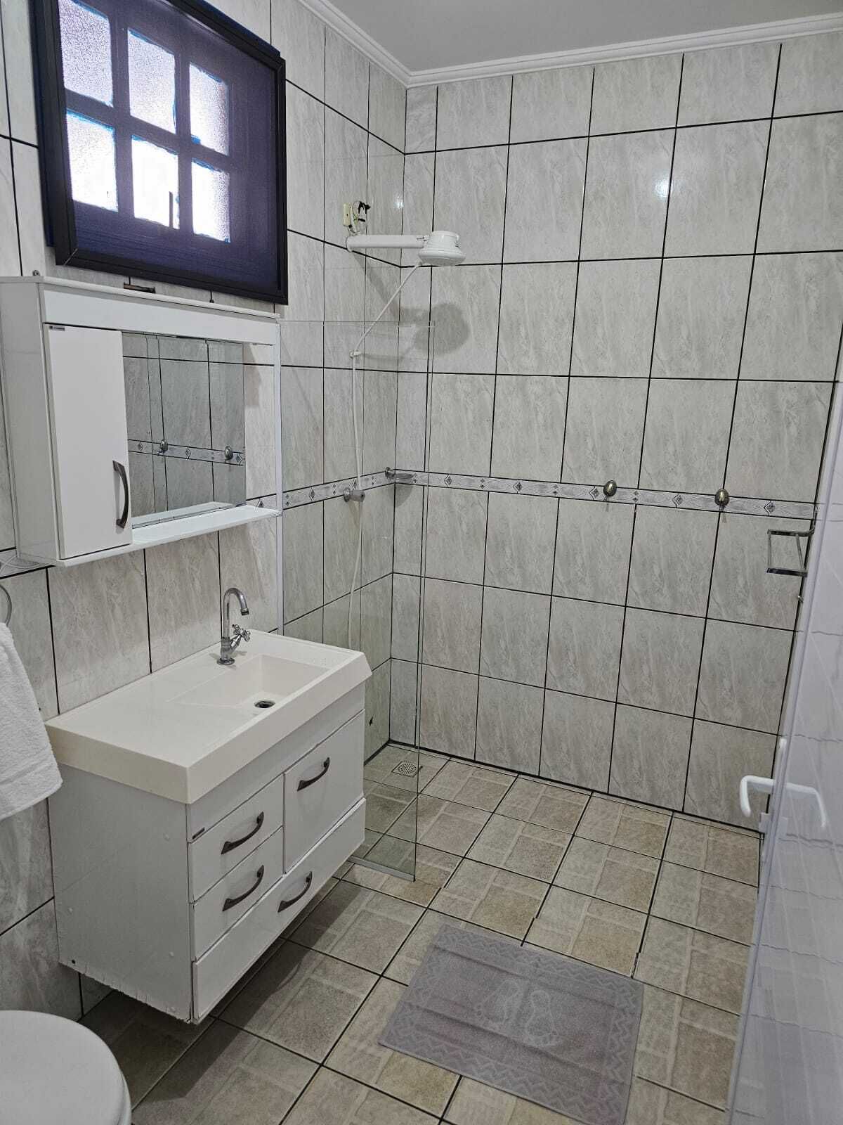 Shower, towels, soap, toilet paper