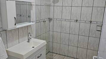 Shower, towels, soap, toilet paper