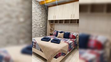 1 slaapkamer, een strijkplank/strijkijzer, gratis wifi, beddengoed