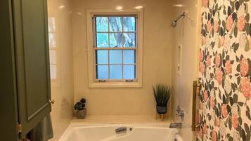 Jetted bath, hair dryer, towels, soap