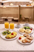 Dagelijks à-la-carte-ontbijt inbegrepen
