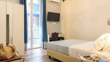 Standard Double Room | In-room safe, desk, laptop workspace, iron/ironing board