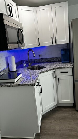 Microwave, coffee/tea maker, cookware/dishes/utensils, spices - The Nook - Studio By Armature Works and Riverwalk (Tampa)