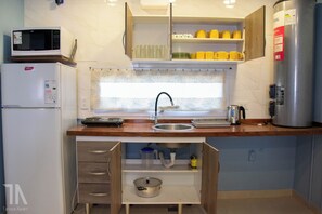 Private kitchen - Cozy 1-bedroom apartment in welcoming Ciudad Evita with AC (Ciudad Evita)