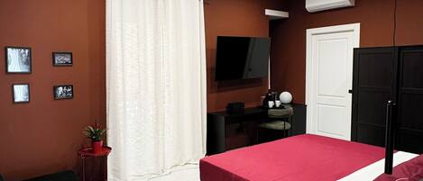 1 chambre, fer et planche à repasser, Wi-Fi gratuit, draps fournis