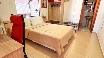 Standard Apartment | In-room safe, desk, laptop workspace, iron/ironing board