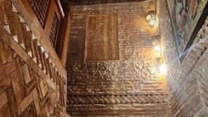 A staircase with intricate wooden carvings and a patterned ceiling. - Riad Dar Kirami  (Fes)