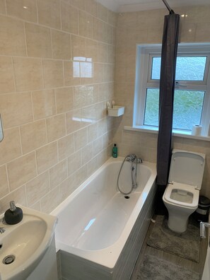 Hair dryer, towels, soap, shampoo