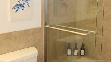 Shower, hair dryer, towels, soap