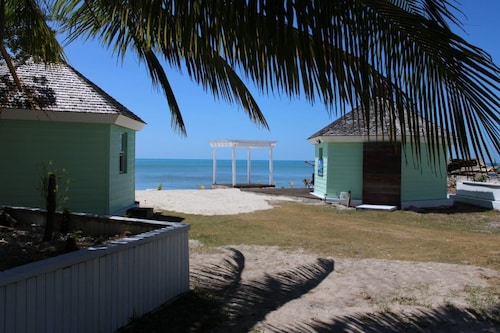 Coral Condominium - Tranquil 2-bedroom right on our private beach.