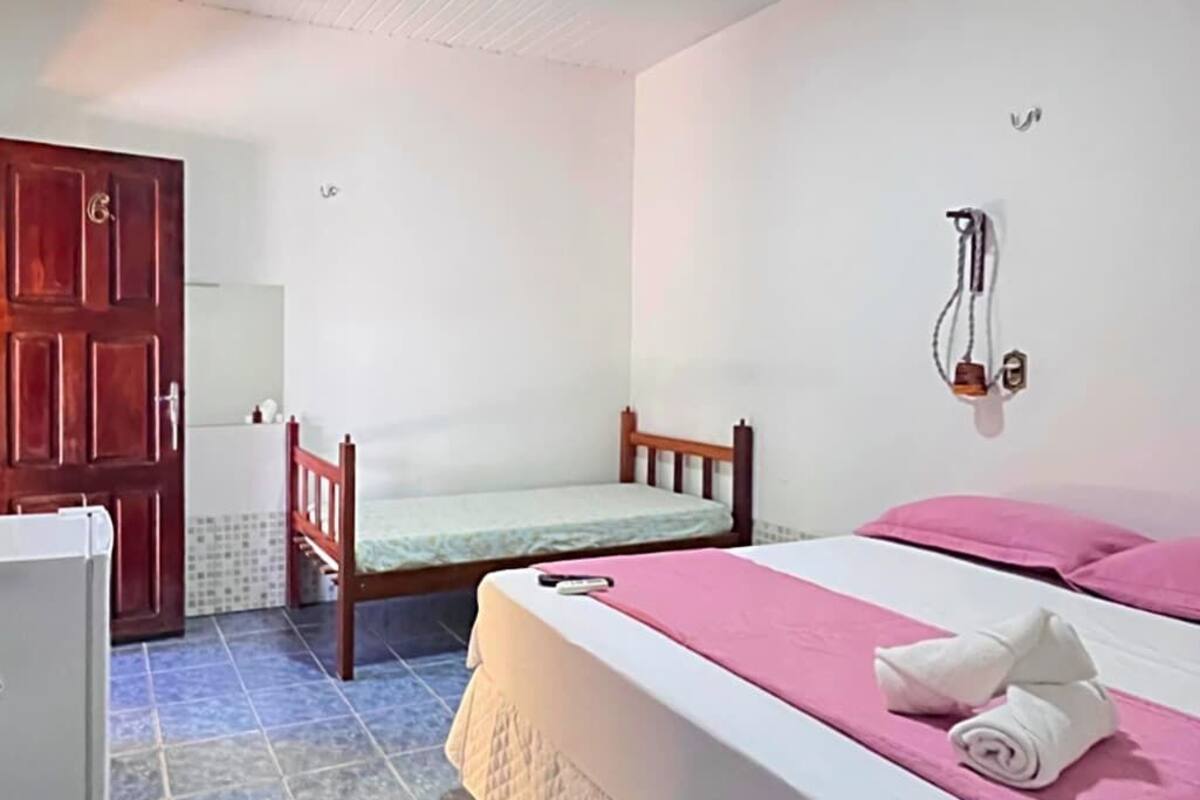 Standard Triple Room, Air conditioning, Courtyard View | Iron/ironing board, WiFi (free)