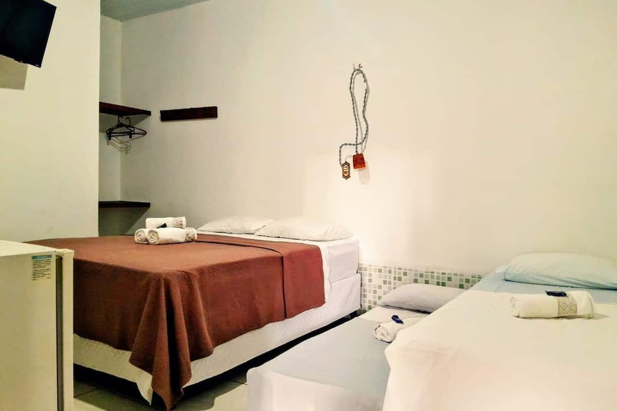 Standard Quadruple Room, Air conditioning | Iron/ironing board, WiFi (free)
