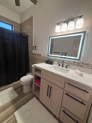 Hair dryer, towels, soap, toilet paper