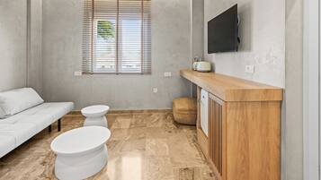 Deluxe Apartment, Balcony, Pool View | Living area