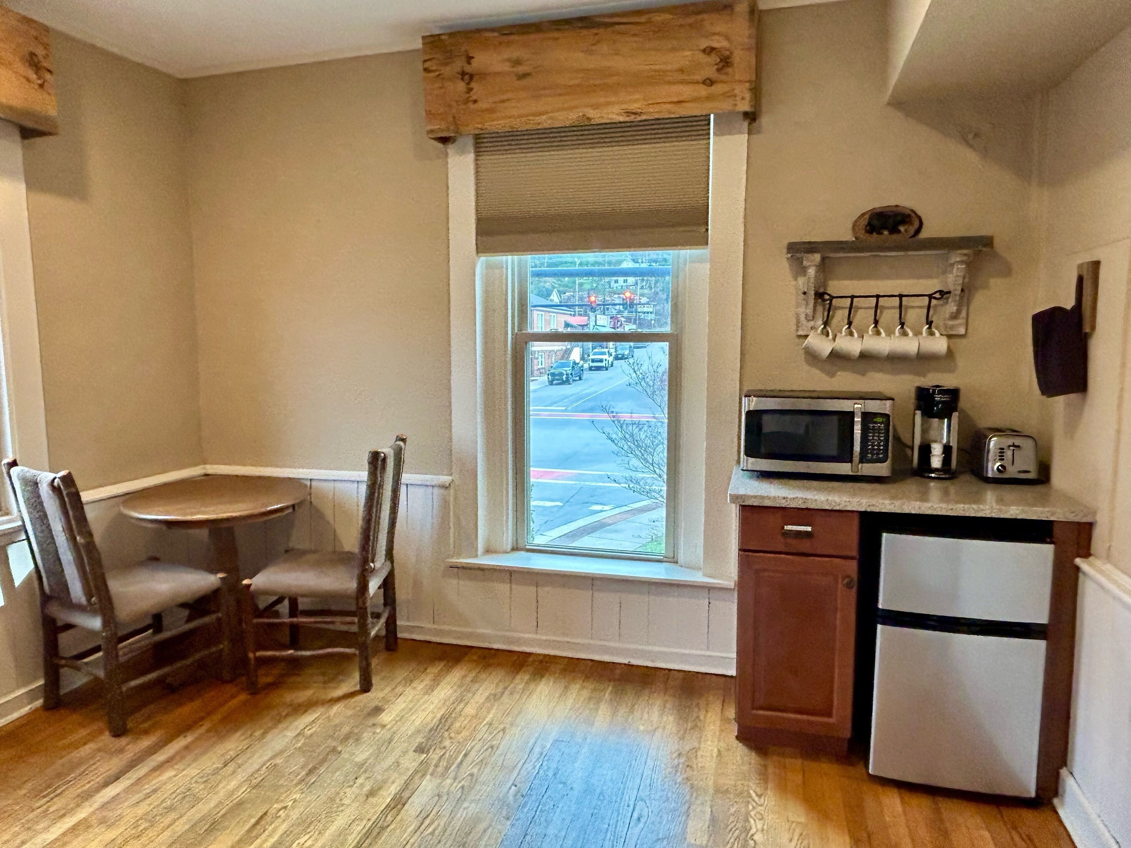 Fridge, microwave, coffee/tea maker, dining tables